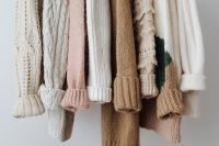 Kaboompics - Pastel Knitwear Details on Clothing Rail