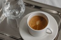 Kaboompics - Coffee Cup and Water Glass Close-Up on Silver Tray