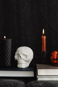 Kaboompics - Skull Decor With Candle and Jack O Lantern