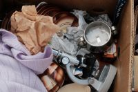 Kaboompics - Vintage Metal Housewares and Cookware in a Flea Market Box
