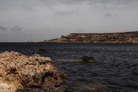 Kaboompics - Maltese Seascape with a Rocky Headland Under Cloudy Skies