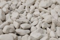 Kaboompics - Horizontal White Pebble Background with Soft Gray Natural Variation