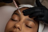 Kaboompics - Cosmetic Injection to Forehead with Syringe