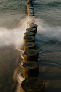 Kaboompics - Long Exposure Wave Groyne Golden Light Detail