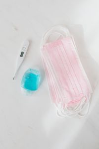 Kaboompics - Overhead Hygiene Kit with Pink Masks and Thermometer
