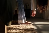 Kaboompics - Morning Stretching Routine in a Sunlit Bedroom