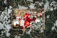 Kaboompics - Vintage Christmas Ornaments in a Wire Basket on Snow