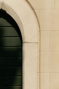 Kaboompics - Stone Arch Detail with Green Door, Italian Building Facade
