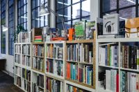 Kaboompics - Rows of different colorful books lying on the shelves in the modern urban bookshop