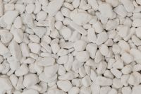 Kaboompics - White Rounded Pebbles Filling a Seamless Natural Stone Background