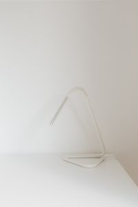 Kaboompics - Cloud Dancer Minimal White Interior with Curved Sculptural Object