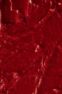 Kaboompics - Red Lipstick Texture with Deep Folded Smears