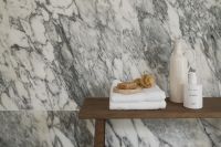 Kaboompics - Wooden Bench with Towels and Soap on Arabescato Wall