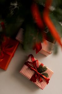 Kaboompics - Red and White Wrapped Gifts beneath Christmas Tree