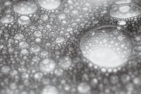 Kaboompics - Dark Gray Soap Foam with a Large White Bubble, Abstract Macro Background