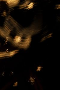 Kaboompics - Golden Light Painting Streaks and Dark Shadows, Vertical Abstract Background Texture