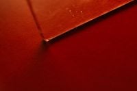 Kaboompics - Red Geometric Paper Fold Abstract Background