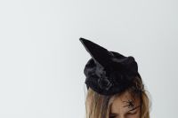 Kaboompics - Woman in Witch Hat with Spider on Face