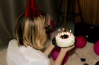 Kaboompics - Woman Wearing Party Hat in a Nostalgic Birthday Scene