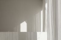 Kaboompics - White Wall and Sheer Curtains with Soft Window Light