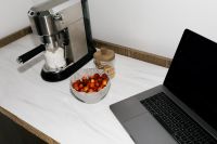 Kaboompics - Flash Photography Aesthetic of Laptop and Espresso Machine on Kitchen Counter