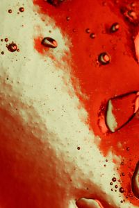 Kaboompics - Red Water Droplets on Glass Abstract Phone Wallpaper