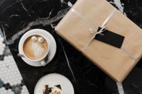 Kaboompics - Wrapping a Gift in a Coffee Shop with Dessert and Coffee