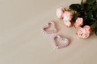 Kaboompics - Pink Roses and Beaded Hearts with Beige Copy Space