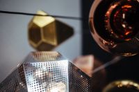 Kaboompics - Abstract Close-Up of Perforated Metal and Copper Pendant Lights