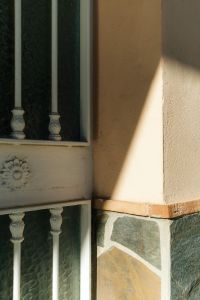 Kaboompics - Sunlit Spanish Facade with Window Grille