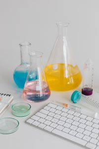 Kaboompics - Colorful Laboratory Flasks With Computer Keyboard