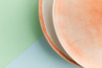Kaboompics - Pastel Plates On Mint And Peach Background