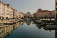 Kaboompics - Trieste Canal Grande Waterfront with Boats and Historic Architecture