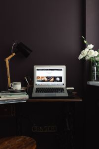 Kaboompics - Minimal Dark Home Office with Laptop and White Flowers