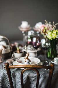 Kaboompics - Round dinner table decorated with easter motifs