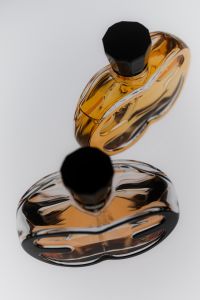 Kaboompics - Amber Perfume Bottle Studio Still Life