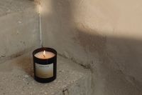Kaboompics - Single Black Candle in a Minimal Concrete Corner