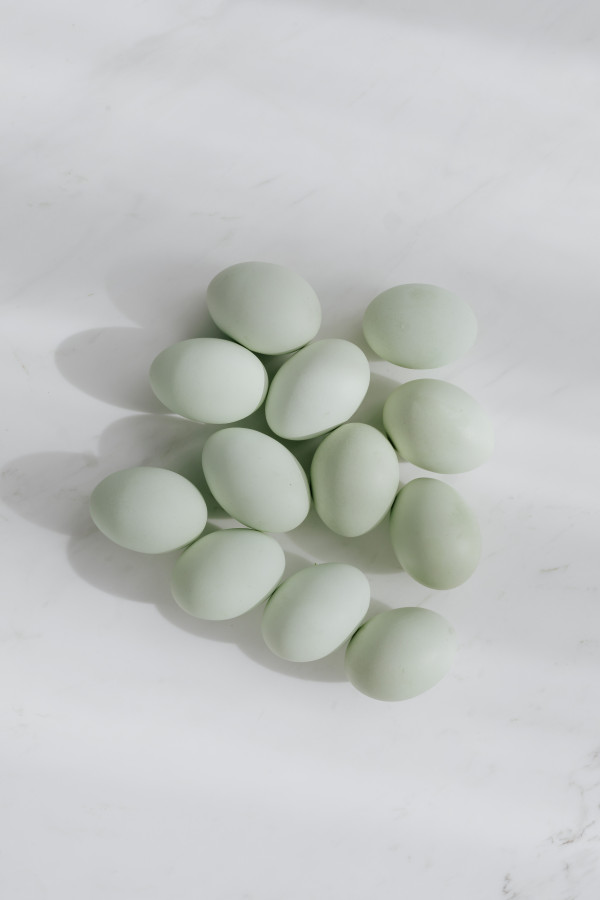 Pastel Green Easter Eggs Clustered on Marble with Soft Shadows for ...