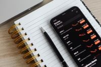 Kaboompics - Top View of Notebook, Pen and Smartphone with Fitness App
