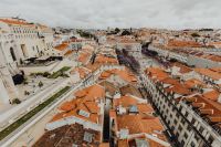 Kaboompics - Elevated Lisbon Old Town Panorama across White Buildings and Terracotta Roofs