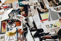 Kaboompics - Designers working with material samples and paper cutouts