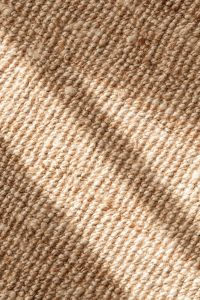 Kaboompics - Sunlit Beige Woven Jute Texture with Fine Diagonal Strands and a Light Stripe