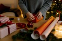 Kaboompics - Overhead Christmas Wrapping Paper and Gift Boxes