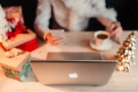 Kaboompics - Holiday Work Desk with Wrapped Gifts, Laptop and Coffee