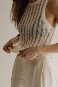 Kaboompics - Neutral Knitted Sleeveless Top and Wide-Leg Pants