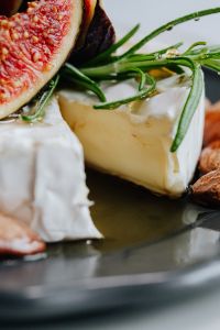 Kaboompics - Side View of Camembert Cheese with Fig and Rosemary