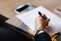 Kaboompics - Woman taking notes