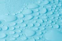 Kaboompics - Light Blue Water Drop Background With Soft Droplet Pattern