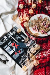 Kaboompics - Gingerbread Cookies on Red Festive Textile with Copy Space
