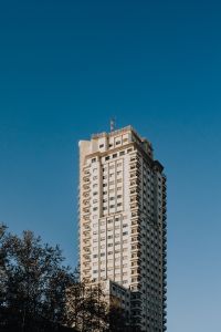 Kaboompics - Modern Madrid High-Rise with Rooftop Antenna Against Clear Blue Sky